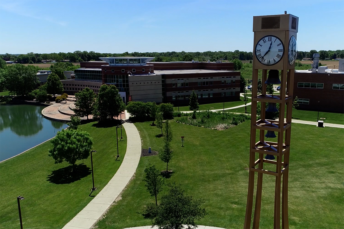 Aerial view of Ohio State Marion campus with bell tower, buildings, and pond