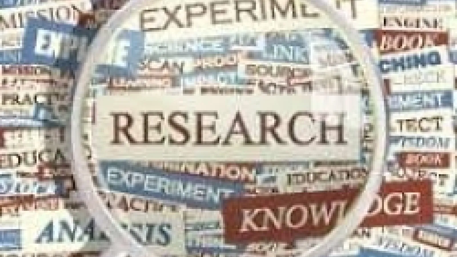 The word "Research" under a magnifying glass