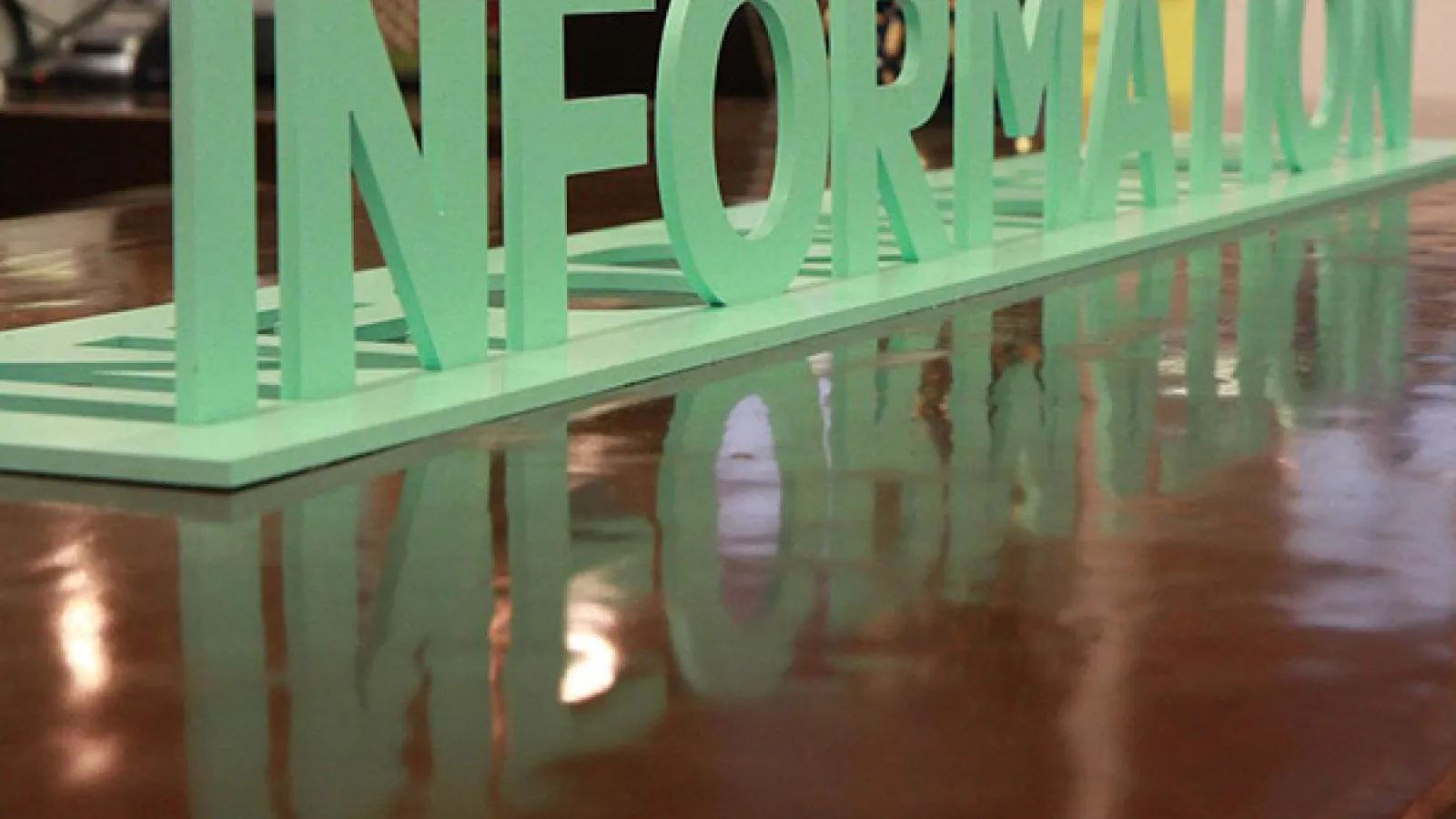 The word "Information" on a desk