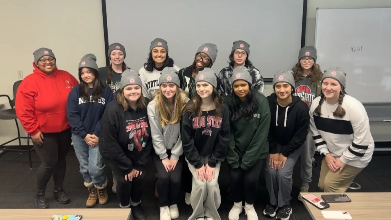 Group of students wearing beanies