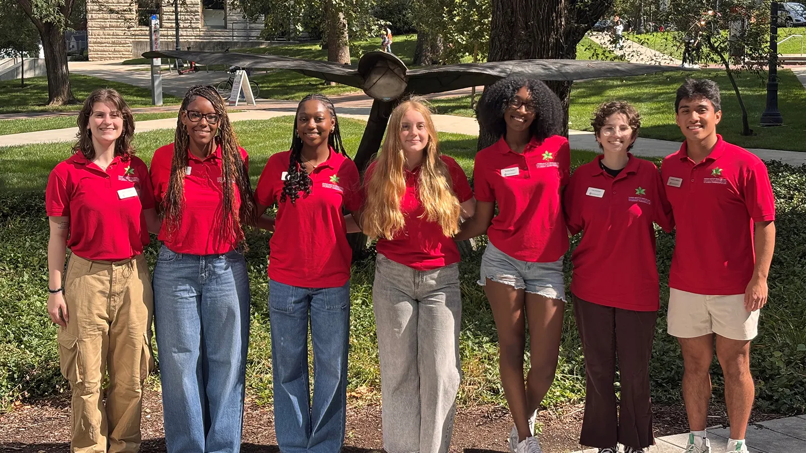 7 Psychology ambassadors standing outside Psychology building