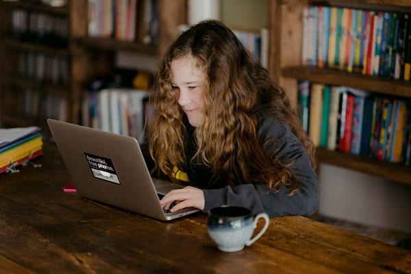 Young Woman in Front of Laptop